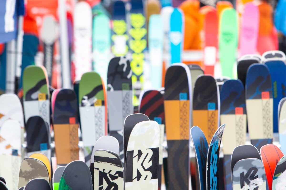 lines on lines of colourful skis stacked up in