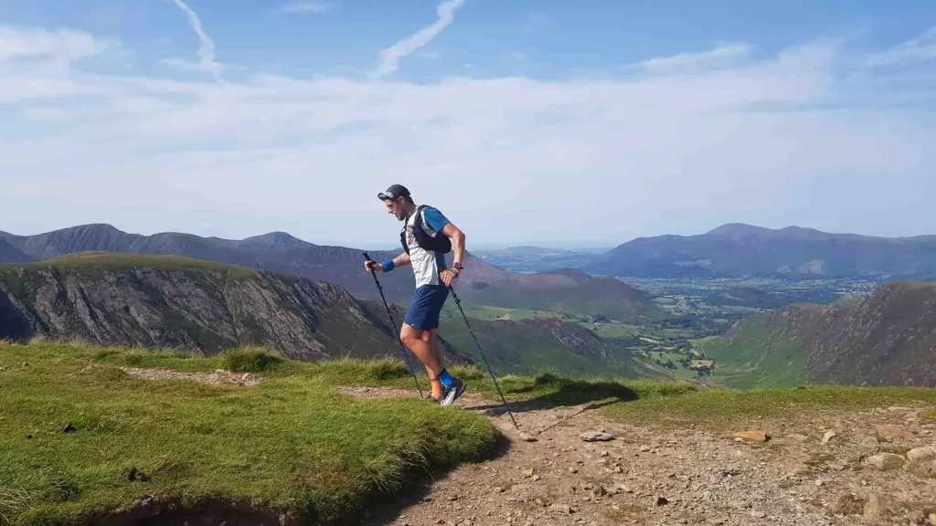 ultra runner Ross Jenkin on the move on a trail through UK hills