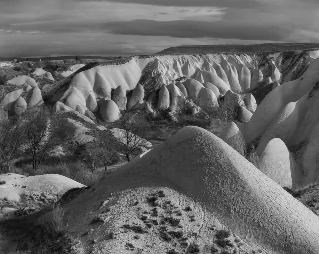 black and white image of bulbous rock formations in Cappadocia, Turkey