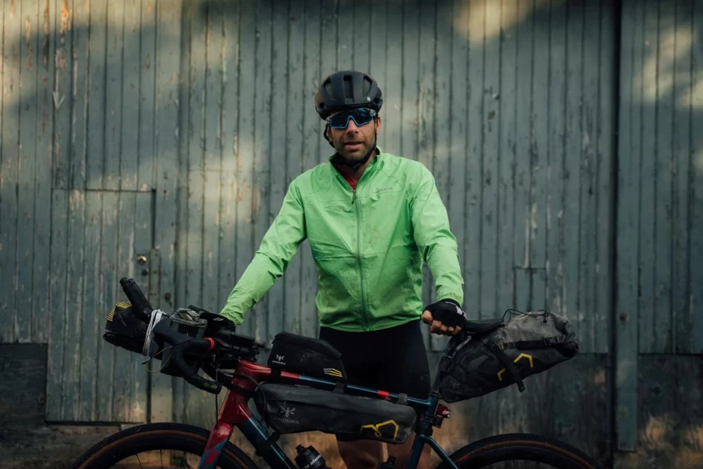 cyclist Mark Beaumont stands by bike, packed up for bikepacking the North Coast 500