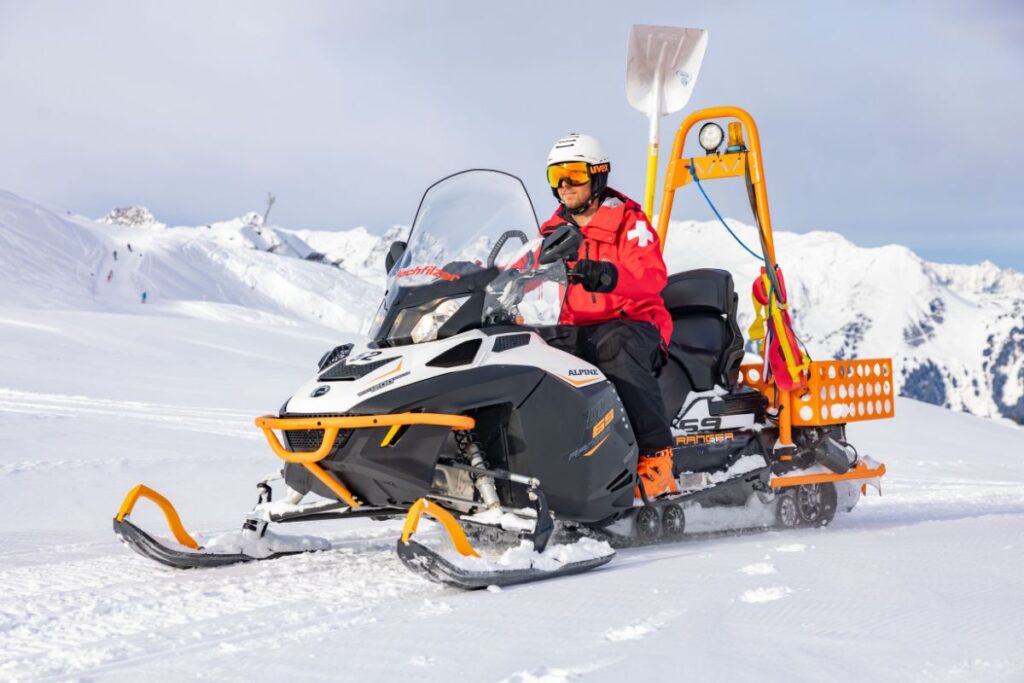 Ski patrol on a skidoo Montafon